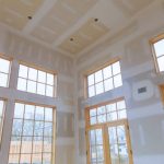 Construction building industry new home construction interior drywall tape and finish details installed door for a new home before installing